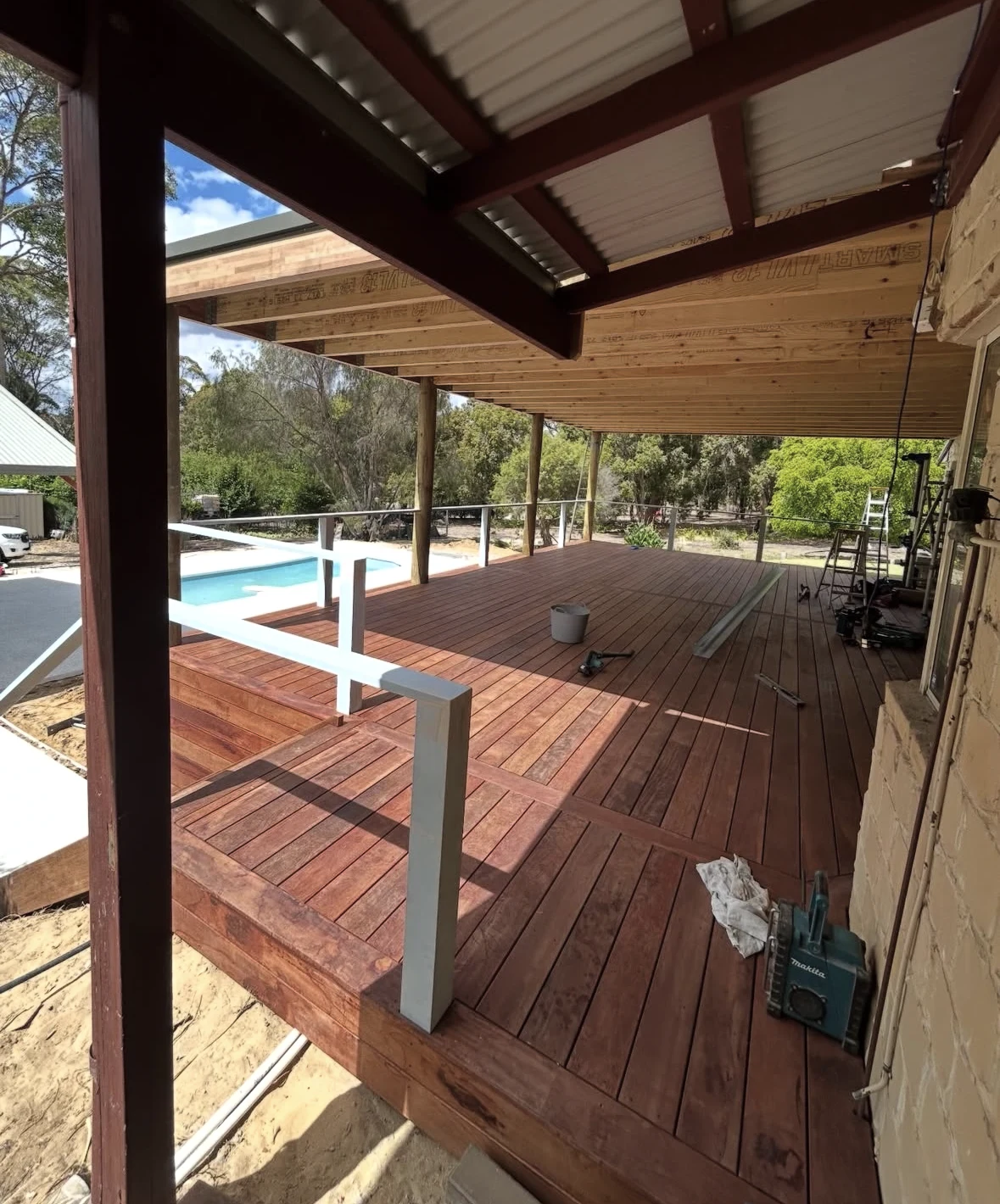 View over the laid merbau decking and outdoor structure