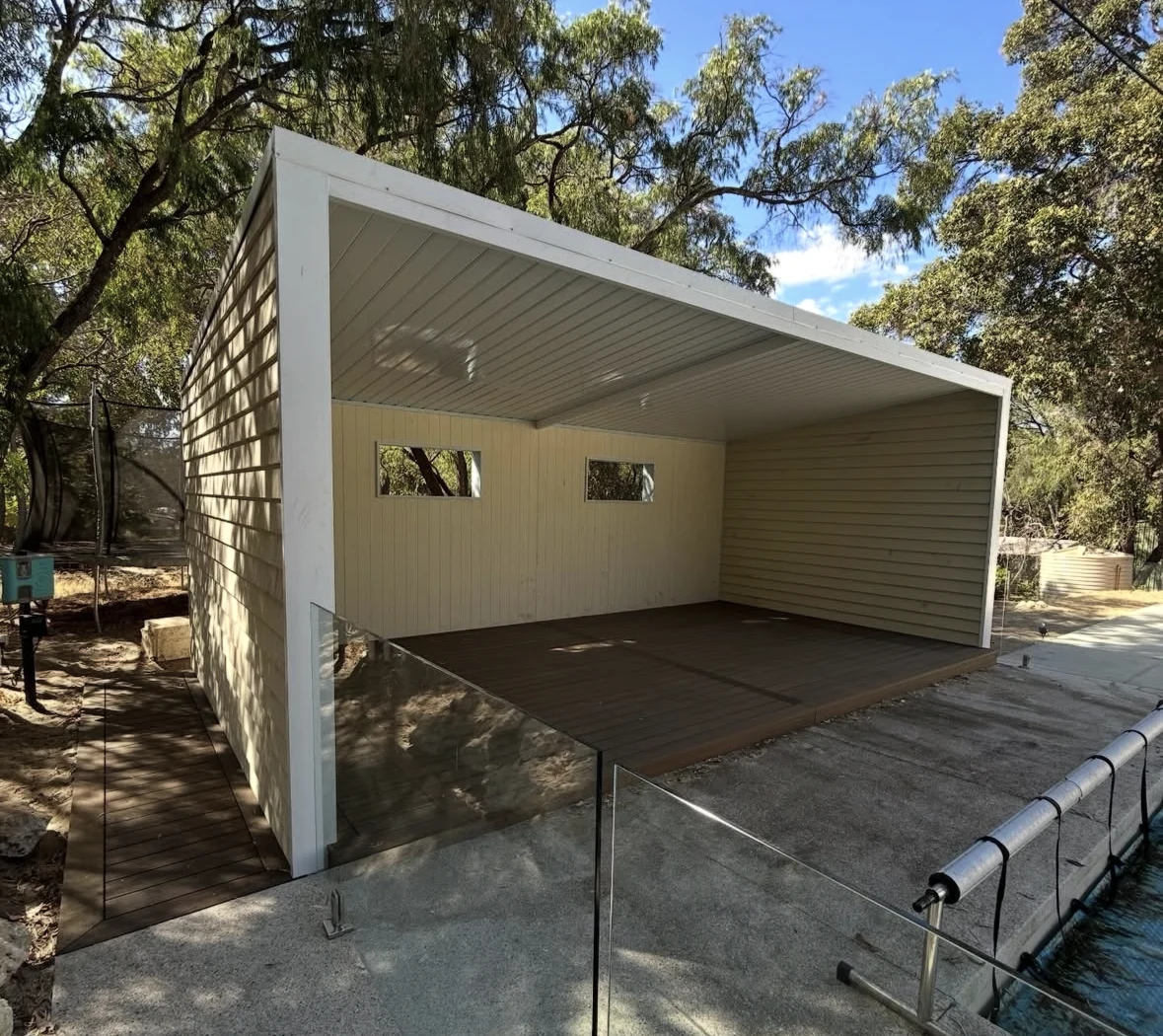 A completed outdoor structure with cladding and decking in Gelorup
