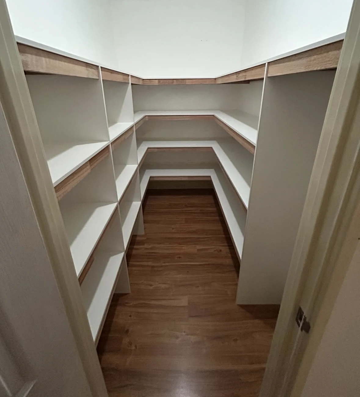 After: custom shelving makes use of both sides of the Donnybrook store room